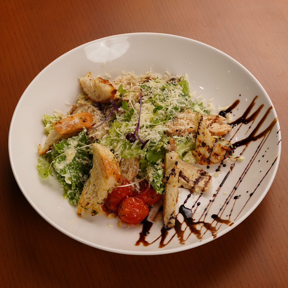 Caesar Salad with Marinated Olives, Confit Cherry Tomato & Sauteed Chicken