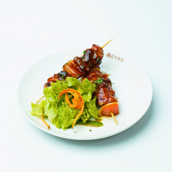 CHERMOURA MARINATED CHICKEN, HOT HONEY DRIZZLE